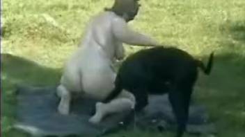 Overweight animal enthusiast wearing a comical mask gets pounded outside