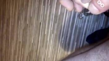 Guy masturbates with a huge worm inside his cock
